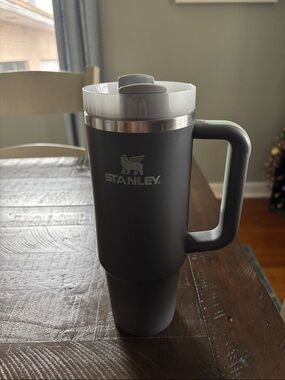 Stanley Matte Dark Gray Travel Mug with White Lid and Handle